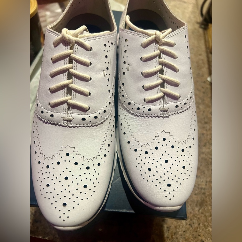 Brand New ColeHaan sneakers, white, sitting in my closet. White best seller